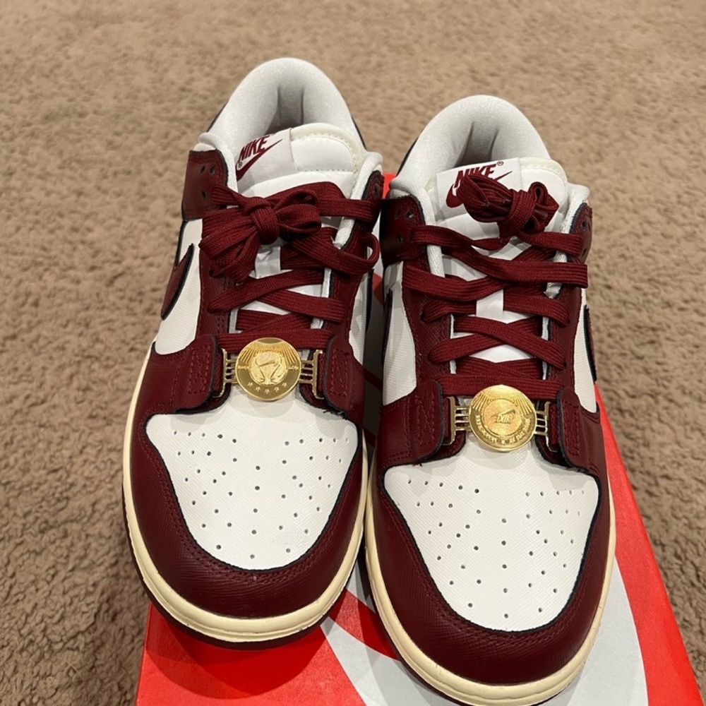 Nike Burgundy and White Sneakers with Gold Accents